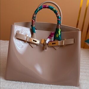 Elegant Beige Handbag with Colorful Handle